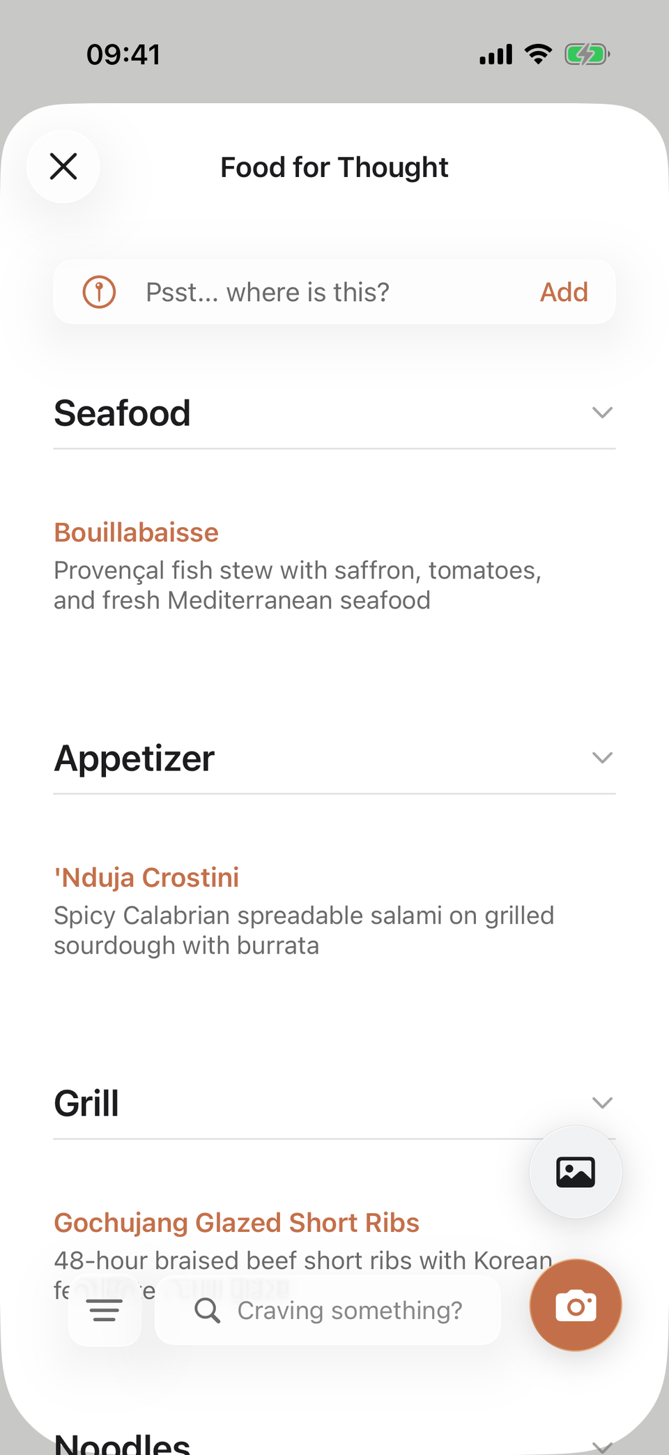 MenuWhisper showing a scanned menu with a short explanation under each dish.